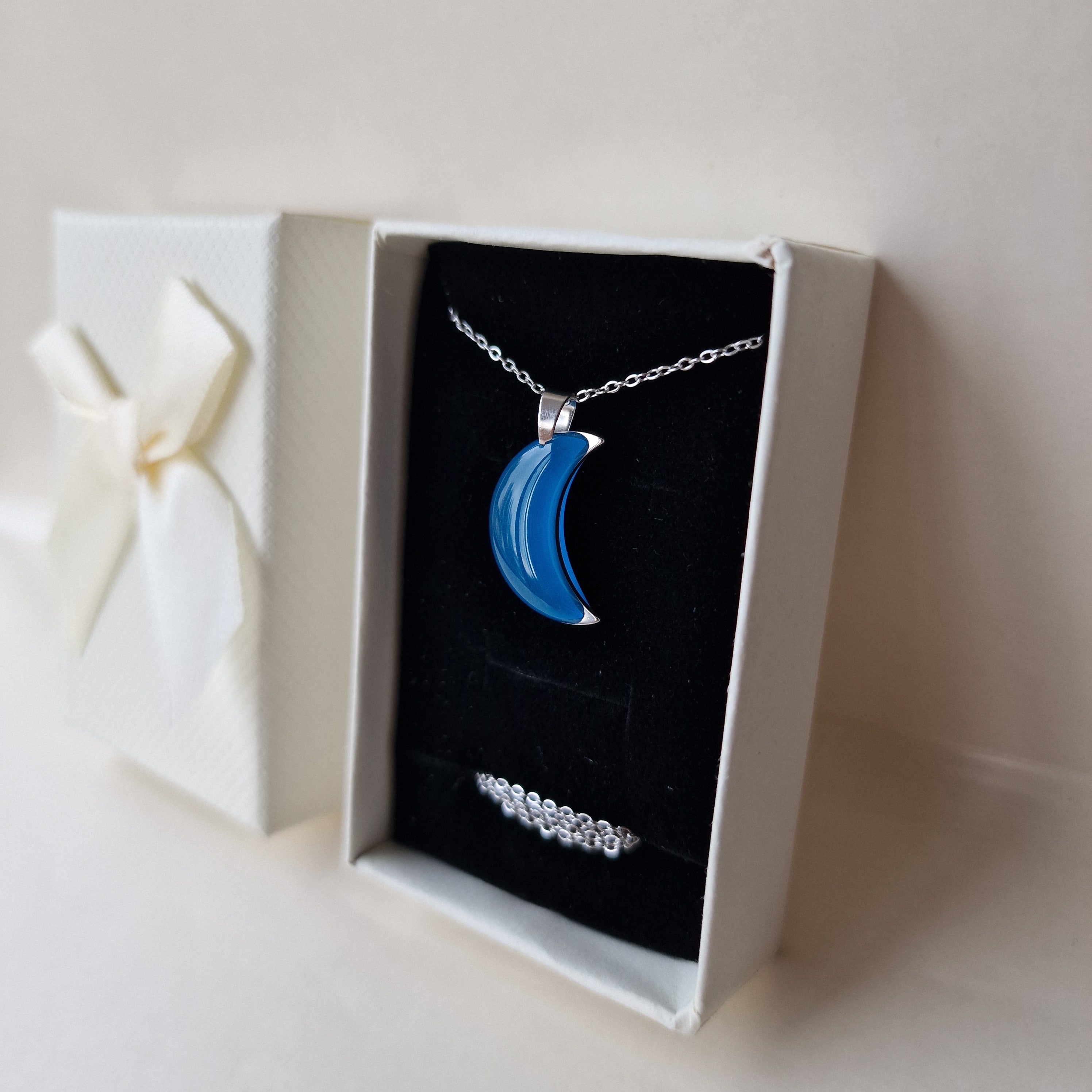 ✨ Glow-in-the-dark moon necklace